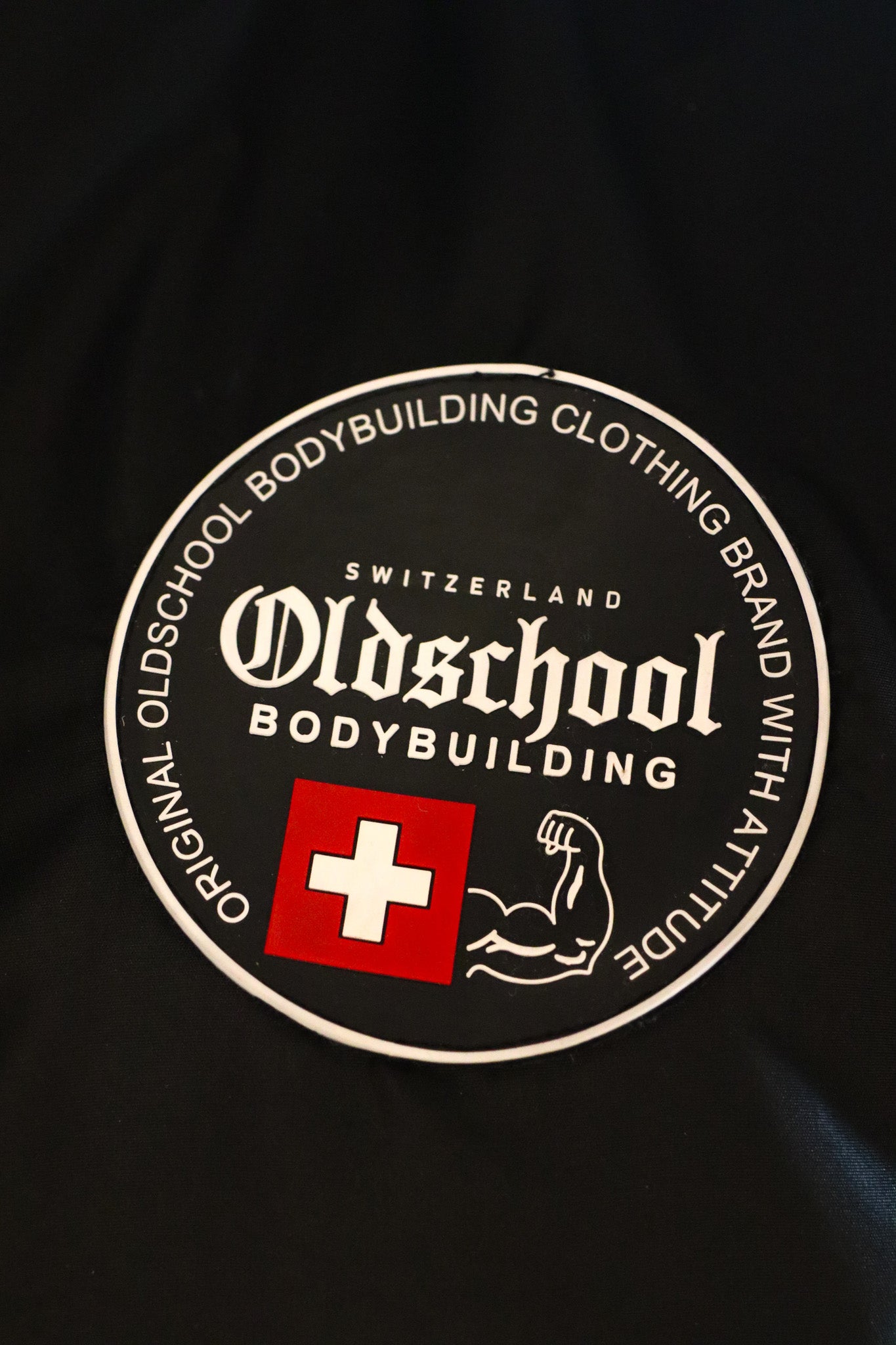 Oldschool Bodybuilding Switzerland Badges Winter Jacket - Schwarz/Orange