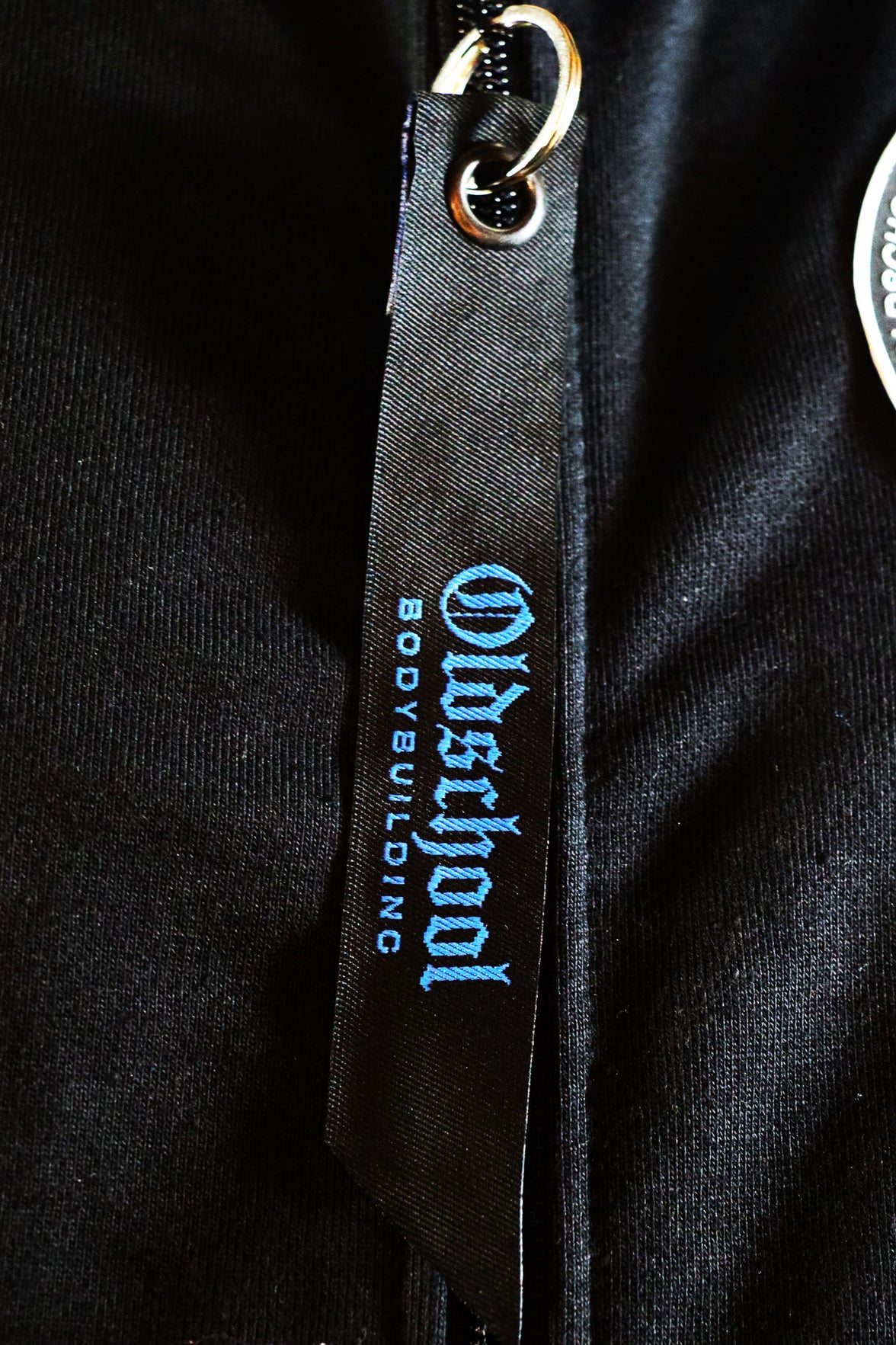 Oldschool Bodybuilding Switzerland Legacy Badges Zipped Hoodie - Schwarz/Blau