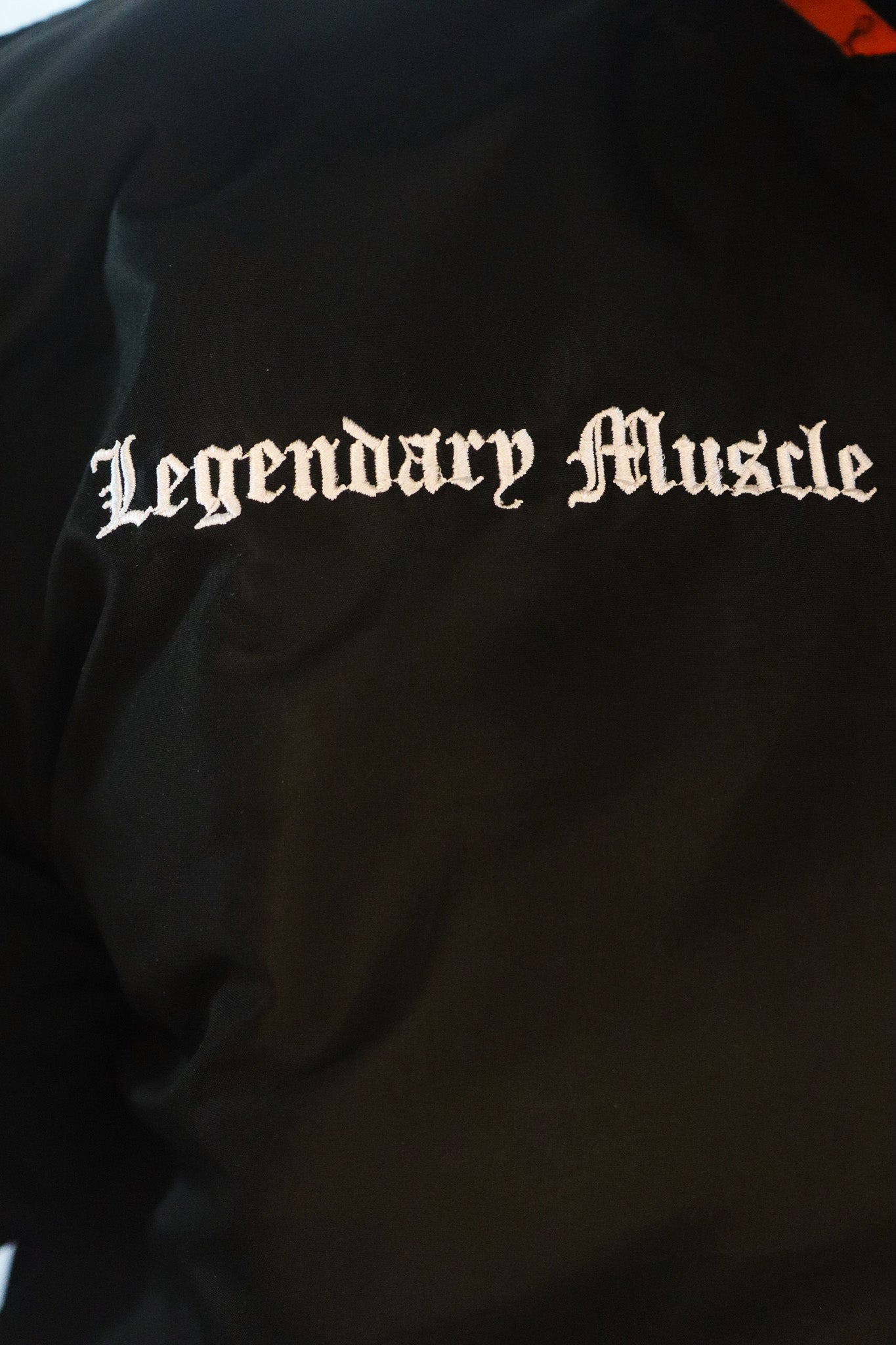 Oldschool Bodybuilding Switzerland Badges Winter Jacket - Schwarz/Orange